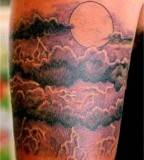 Magnificent Sun and Clouds Tattoo Design for Men