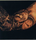 Bold 3D Tattoo Design on Arm for Men