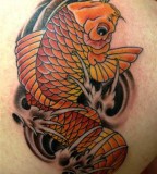 Red Koi Fish Tattoo On Back Shoulder