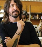 Dave Grohl's Feather Tattoo On His Left Forearm