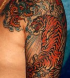 Awesome Tiger And Dragon Tattoo