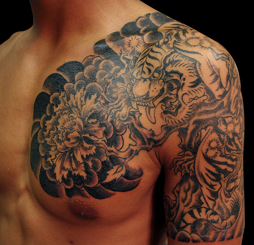 Chest and Half Sleeve Dragon and Tiger Tattoo