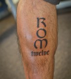 Lettering ROM Twelve - Leg Tattoo Design