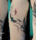 Stunning Arm Bird Feather Tattoo