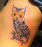 Owl on Feather Arm Tattoo