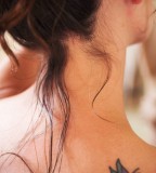 Feminine and Cute Small Butterfly Upper-Back Tattoo Designs for Women