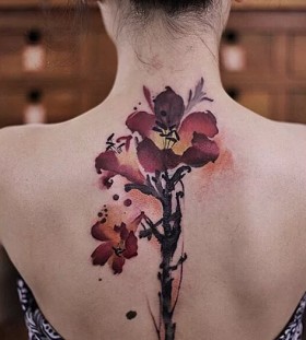 flower down spine tattoos for women