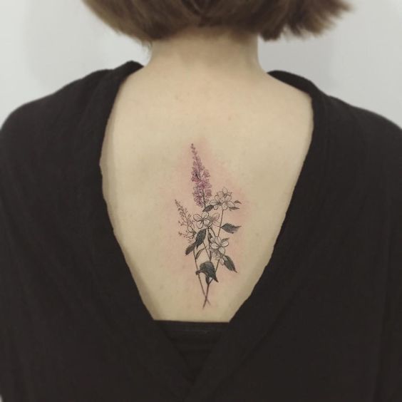 flower tattoo on back