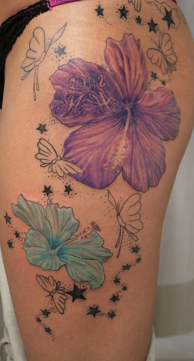 2 Flower Stars Butterflies Tattoo On Thigh
