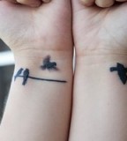 Nice Flying Birds Silhouette Tattoo Image On Wrist 