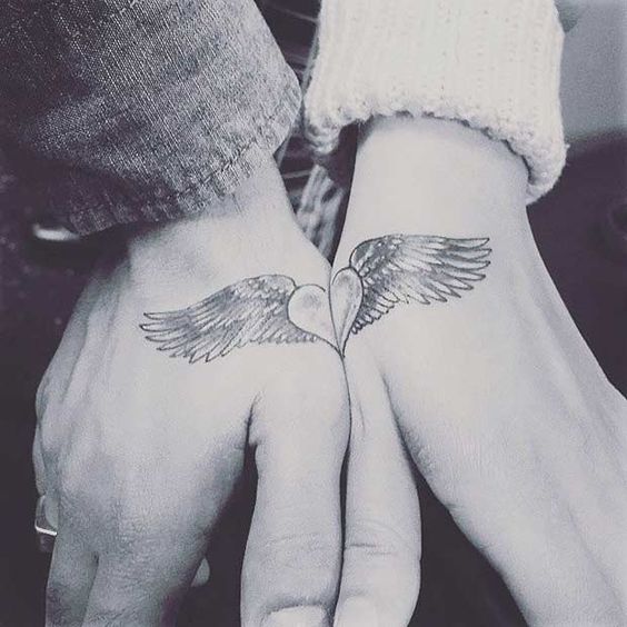 flying heart couple tattoo
