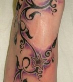 Cool Tribal and Star Tattoo Design on Foot