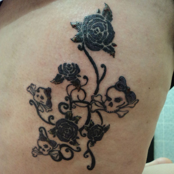 Awesome Skulls and Roses Tattoo