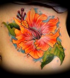 Hibiscus Flower On Ribs Tattoo Ideas