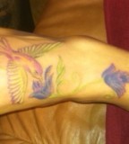 Carries Hummingbird Tattoo Design On Foot