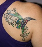 Designing Hummingbird Upper Back Tattoo