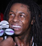 Lil Wayne Forehead / Cheek / Eyes Tattoos