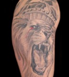 Blood-teared Lion with Crown Tattoo Designs for Women