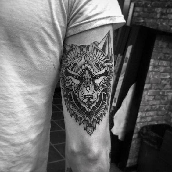 lone wolf tribal tattoo