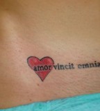 Small Latin Love Conquers All Tattoo Picture