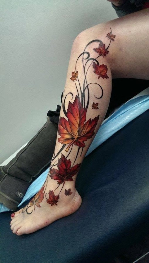 maple-leaves-on-leg-autumn-tattoo