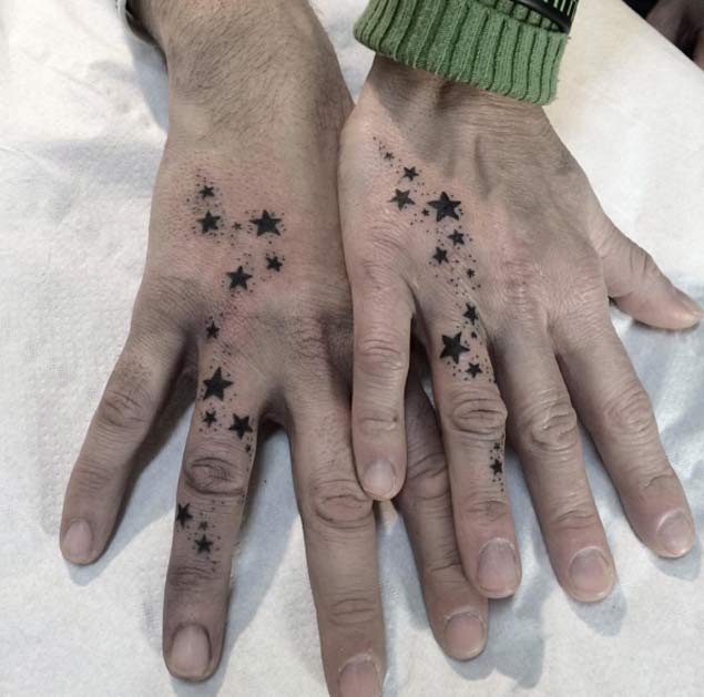 matching stars couple tattoo