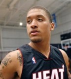 Michael Beasley - Upper Arm And Shoulder Tattoo