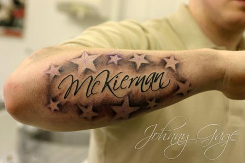 Name With Shaded Stars Tattoo On Forearm