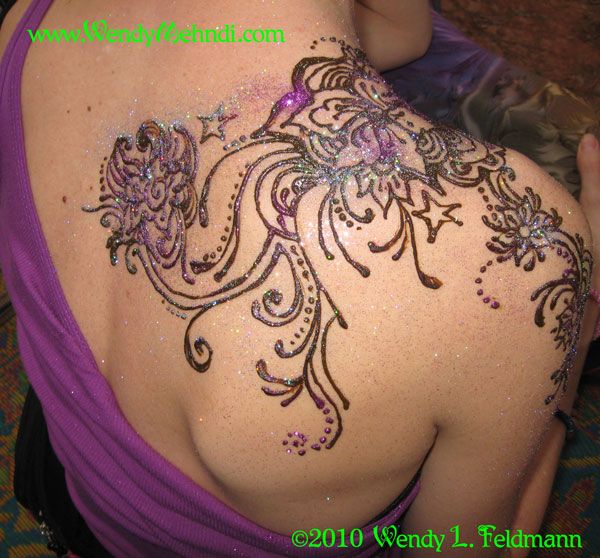 Swirly and Sparkling Flower Tattoos Wrapping Over Shoulder – Flower Tattoos for Women