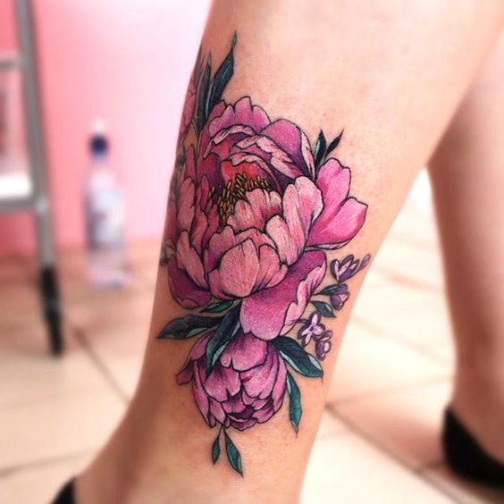 pink watercolor flower tattoo