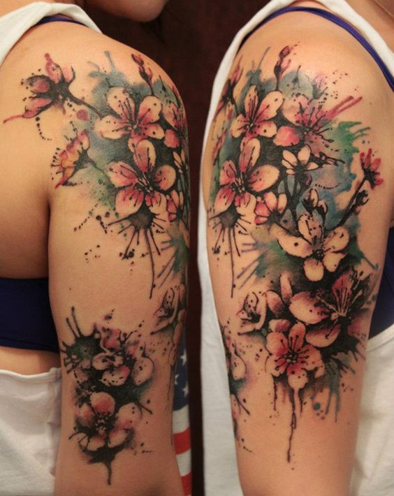pretty arm watercolor flower tattoo