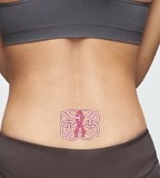 Purple Ribbon Tattoo On Hip For Girl