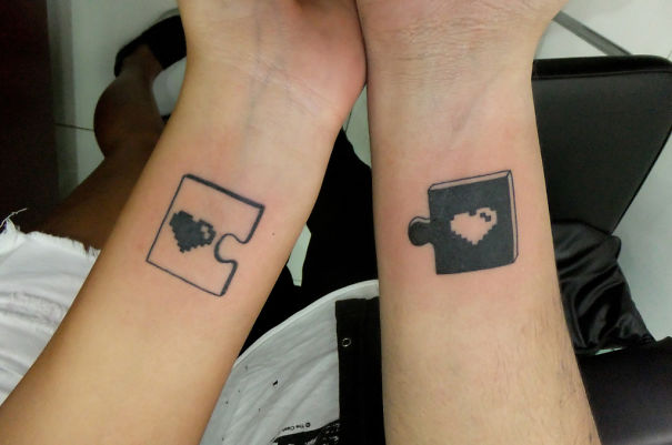 puzzle with heart couples tattoos
