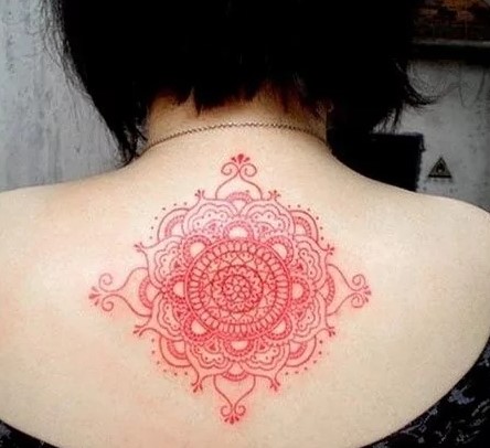 red ink mandala tattoo