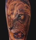 Symbol of Strength Roaring Lion Tattoo