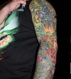Grim Reaper And Rose Vines Tattoos
