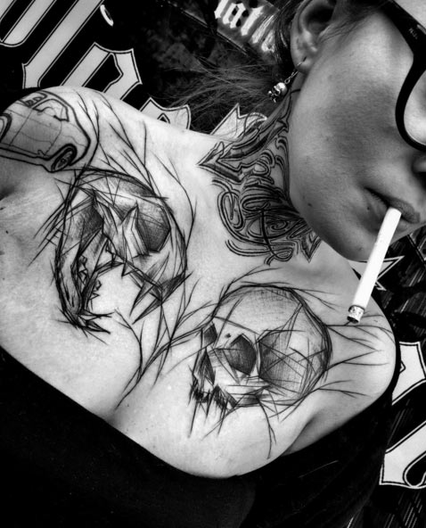 skull chest piece tattoos for women