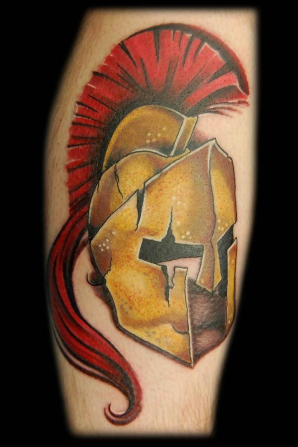 Bronze Spartan Helmet Tattoo On Arm
