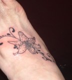 Lily Tattoo Design on Hand