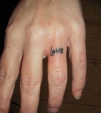 Mind Blowing Love Tattoo Design on Ring Finger