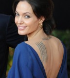 Angelina Jolie Service Translation tattoo