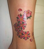Cherry Blossoms Tattoos Design on Leg for Women