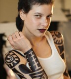 Girl with Awesome Tribal Tattoo Designs