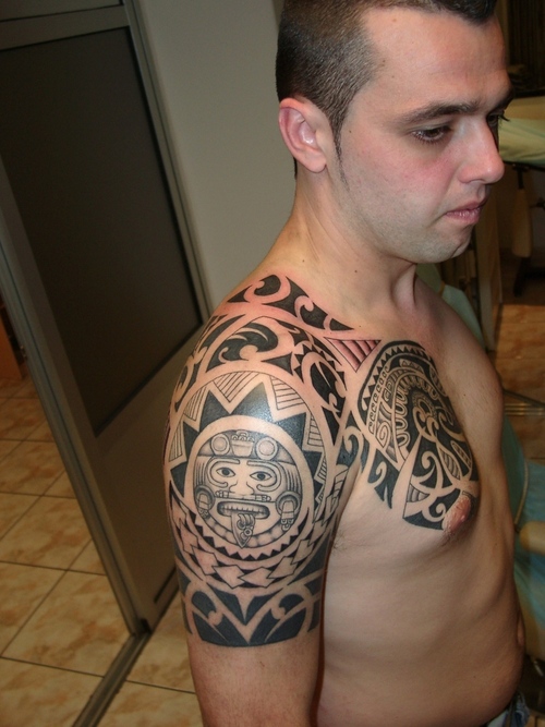 Cool Tribal Tattoo Design on Arm for Men