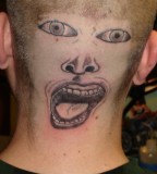 Bold, Dumb, and Funny Guy Face Tattoo on Head