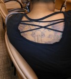 Bold yet Funny Adult Stuff Tattoo on Women Back (NSFW)