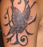 Amazing Flying Butterfly with Tribal Background Sleeve Tattoo