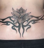 Lower Back Tribal Tattoo Design For Women
