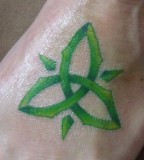 Bright Green Celtic Trinity Knot Tattoo on Leg