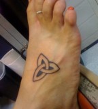 Cute Celtic Trinity Knot Leg Tattoo Design for Women